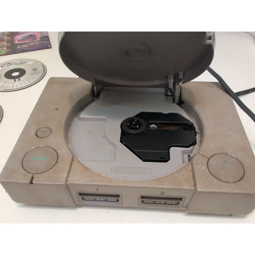 Sony PlayStation 1 Gray  System Tested Working Plus 2 Controllers 8 Games Cords